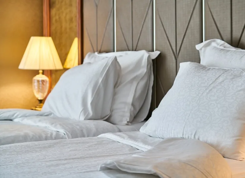 Pillows and quilt on a bed
