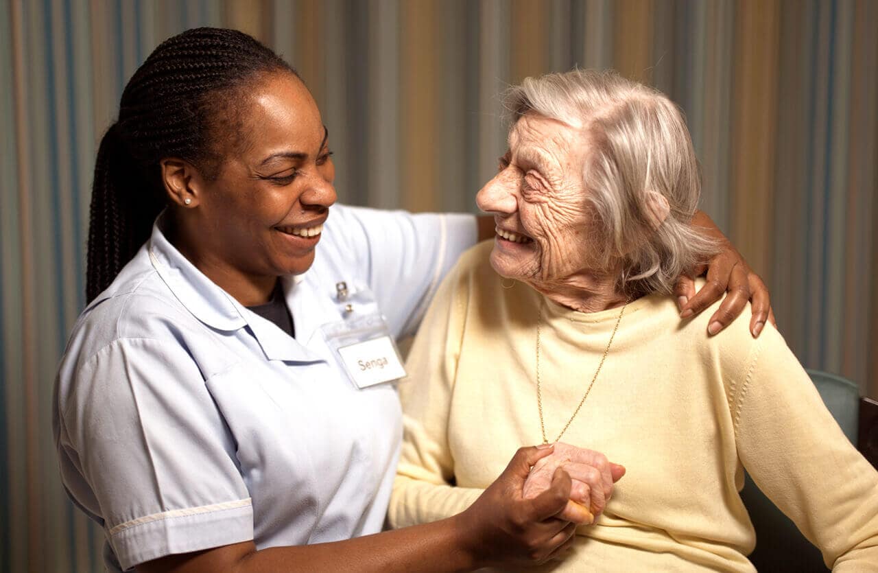 Care worker with resident